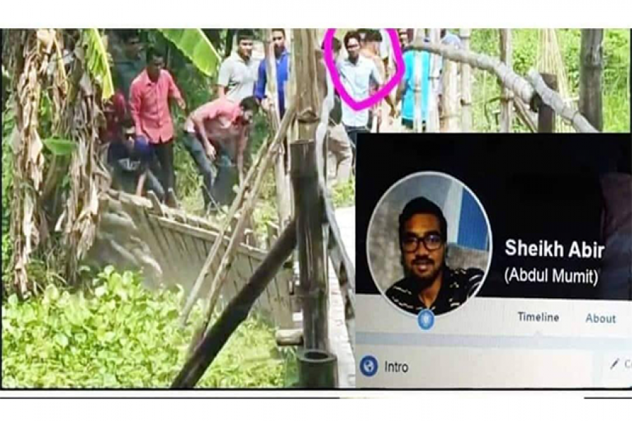 প্রশাসনিক কর্মকর্তা শেখ আবিরের নেতৃত্বে শিক্ষার্থীদের 
উপর হামলার একপর্যায়ে সংযোগ সড়ক ভেঙে ফেলা হচ্ছে।