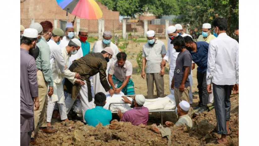 করোনায় মৃত ব্যাক্তির লাশ দাফন