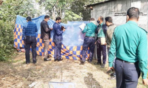 কবর থেকে তোলা হলো কুয়েট শিক্ষকের মরদেহ