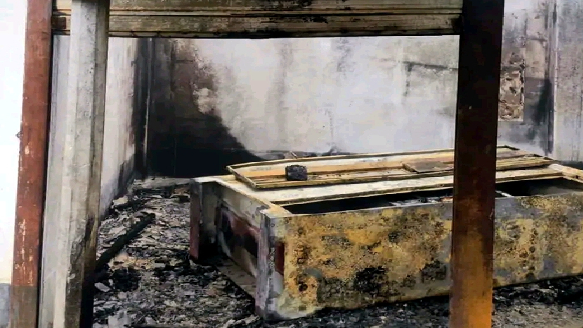বি